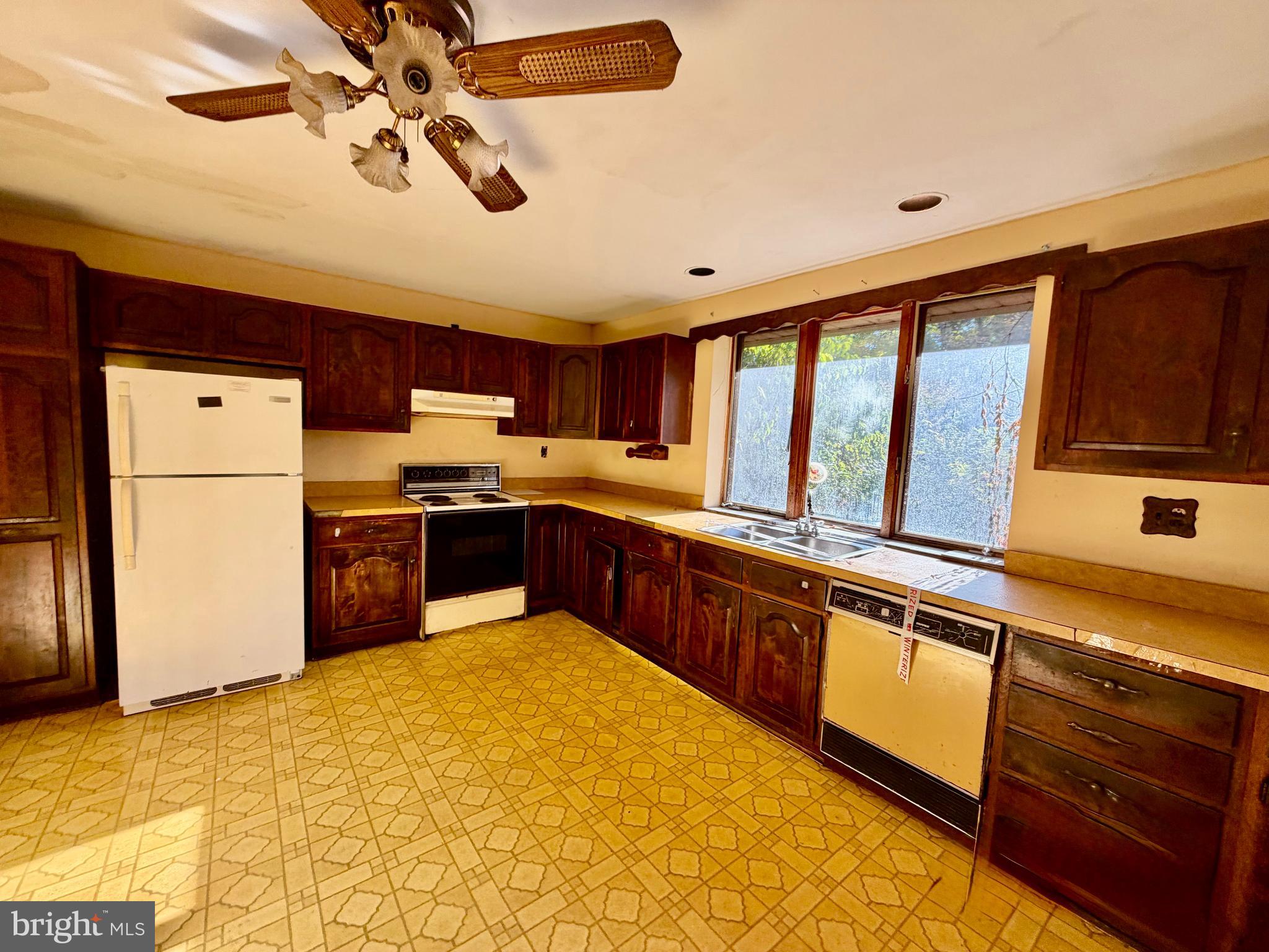 318 Marienstein Road Upper Black Eddy, PA 18972 - Photo 5 of 14 a kitchen with stainless steel appliances granite countertop a refrigerator and a stove top oven