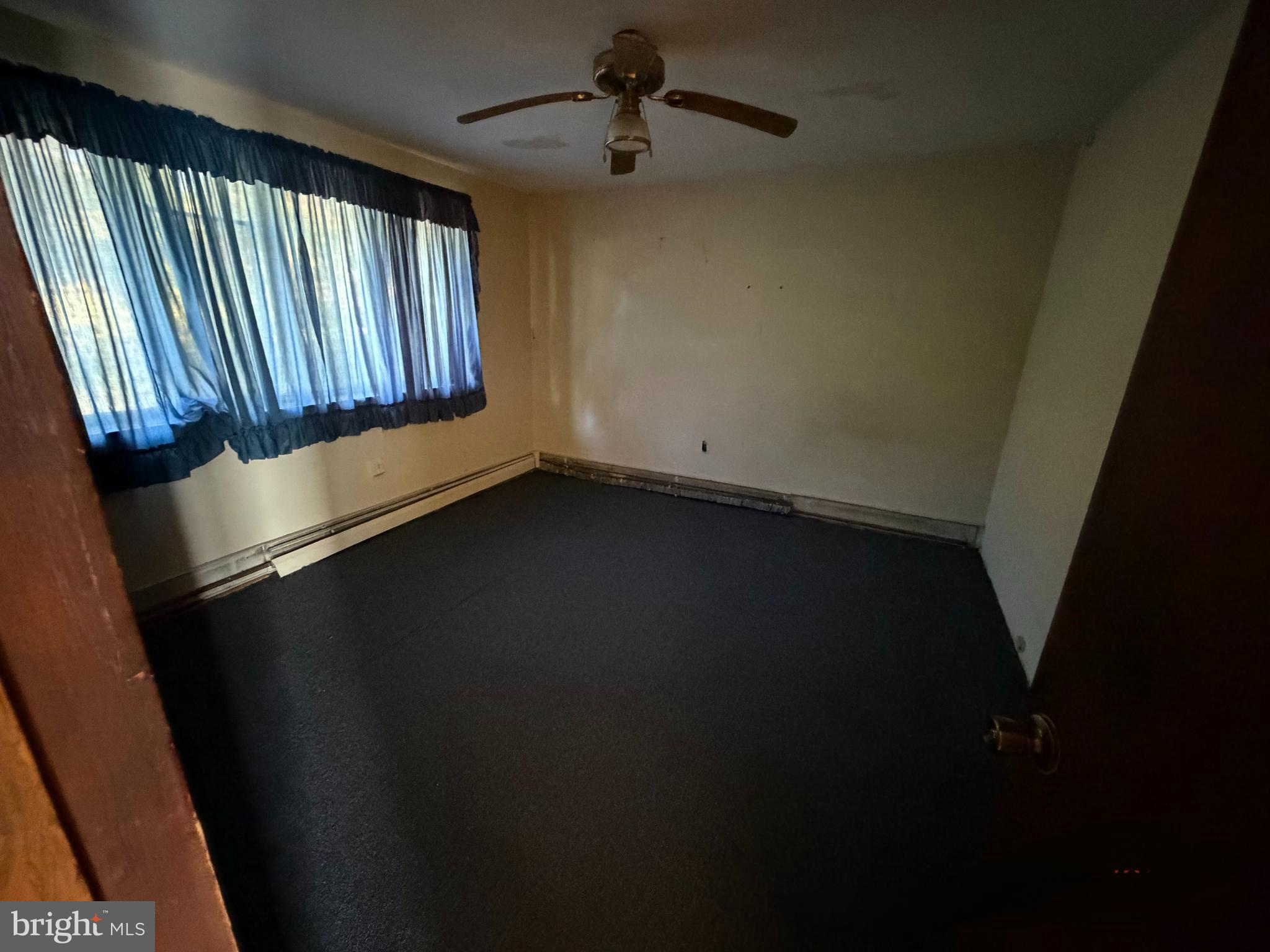 318 Marienstein Road Upper Black Eddy, PA 18972 - Photo 6 of 14 wooden floor in an empty room and a window