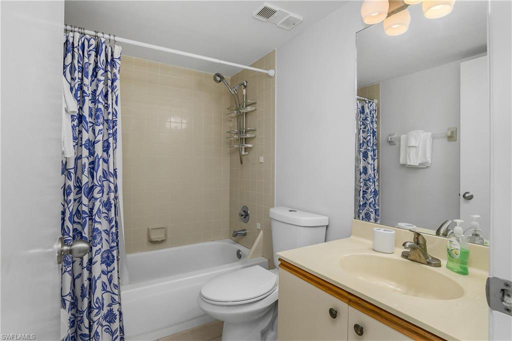 1330 Yesica Ann Circle, Unit I106 Naples, FL 34110 - Photo 21 of 38 a bathroom with a sink toilet and shower