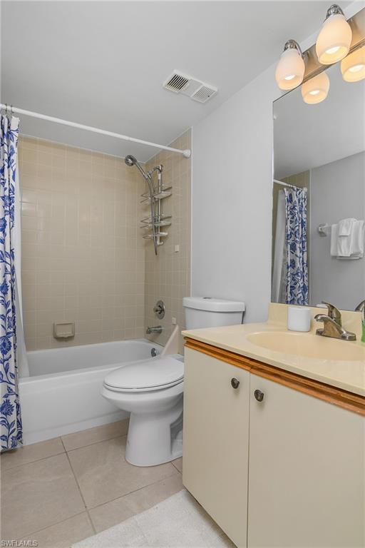 1330 Yesica Ann Circle, Unit I106 Naples, FL 34110 - Photo 22 of 38 a bathroom with a sink a toilet and shower