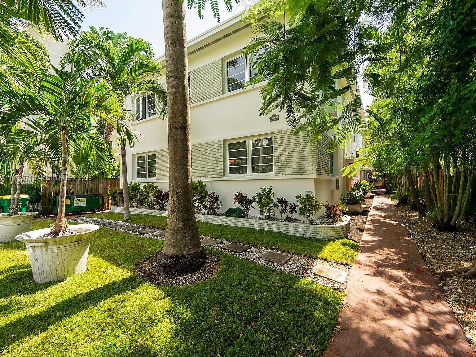 1537 Jefferson Avenue, Unit 3 Miami Beach, FL 33139 - Photo 1 of 10 a view of a house with backyard and sitting area