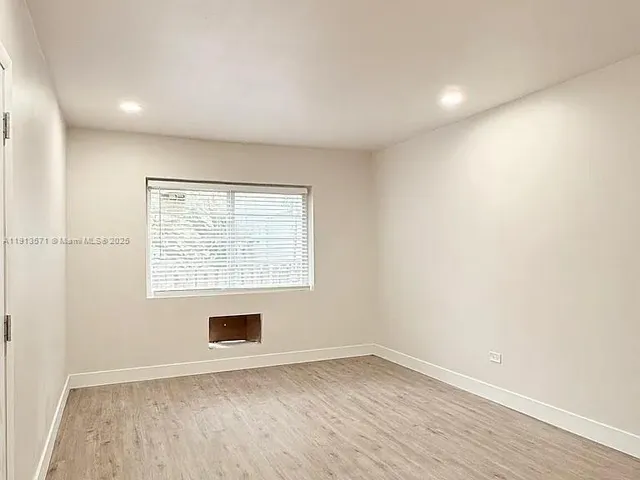 an empty room with a window
