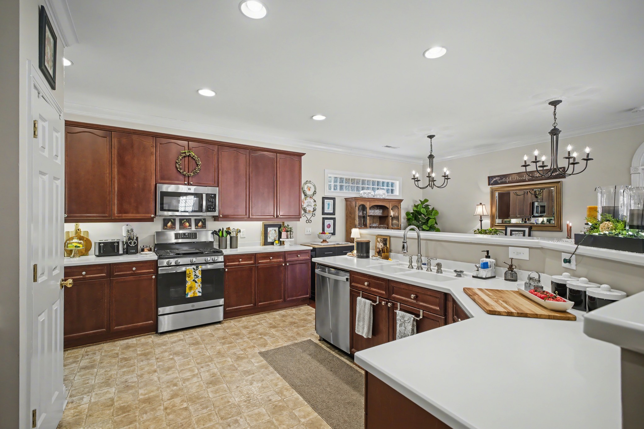 213 Lilac Circle Franklin, TN 37064 - Photo 13 of 33 a kitchen with cabinets a sink and appliances