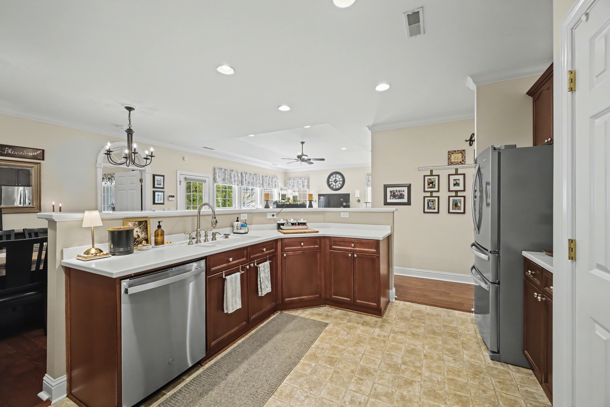 213 Lilac Circle Franklin, TN 37064 - Photo 15 of 33 a kitchen with stainless steel appliances granite countertop a sink and stove