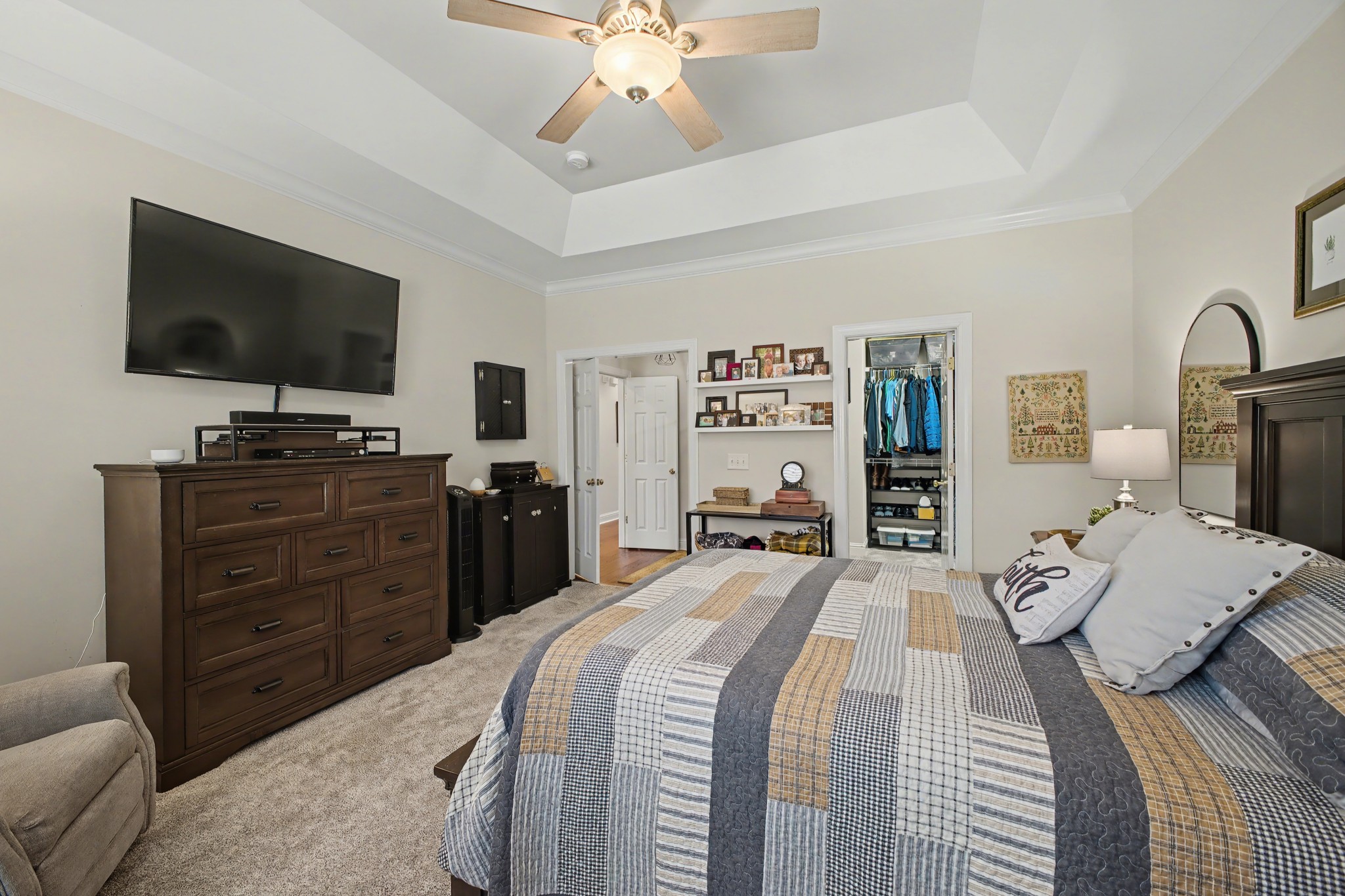 213 Lilac Circle Franklin, TN 37064 - Photo 17 of 33 a bedroom with a bed and a flat screen tv