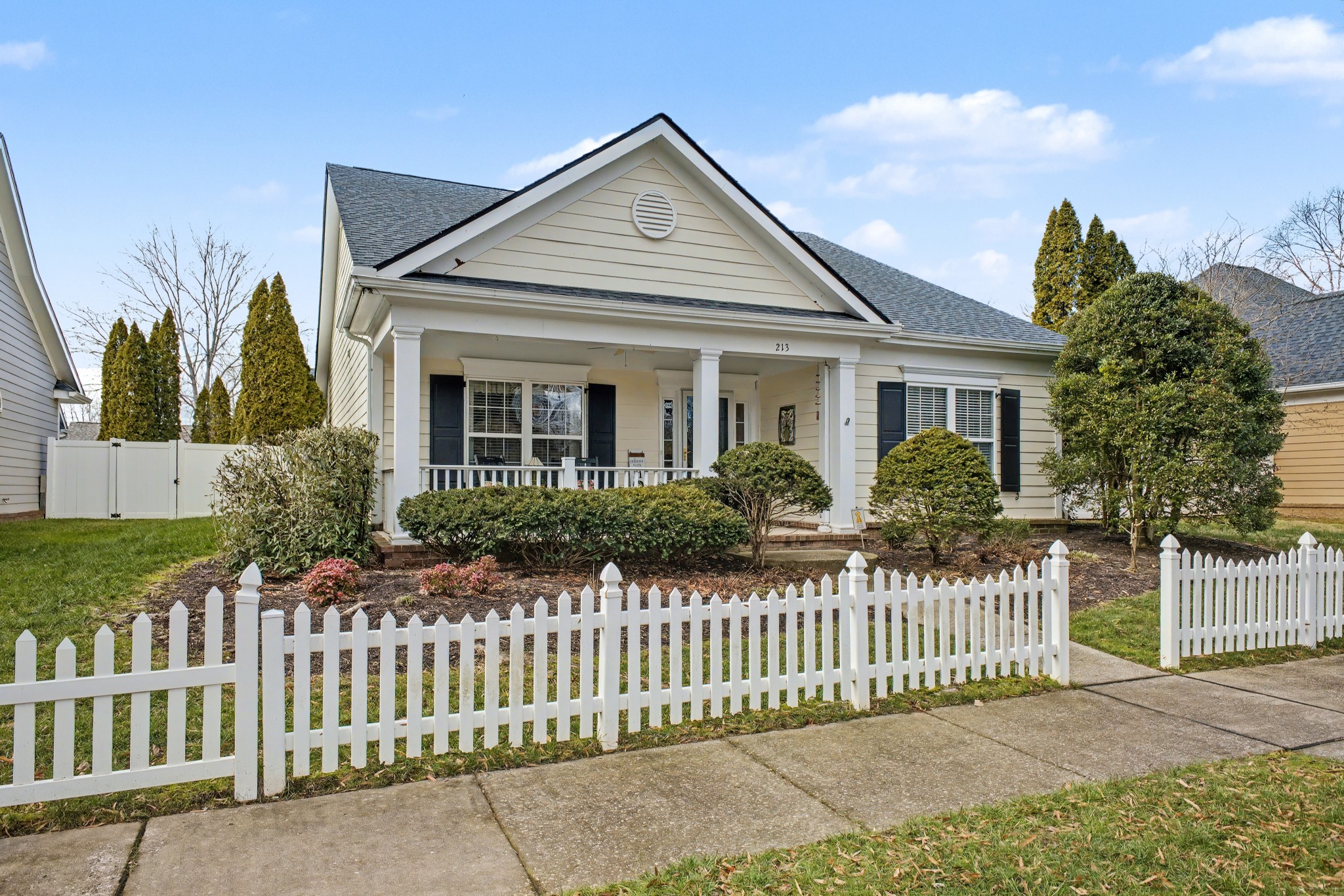 213 Lilac Circle Franklin, TN 37064 - Photo 2 of 33 a front view of a house with a garden