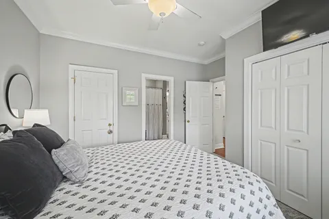 a bathroom with a sink vanity shower and a mirror