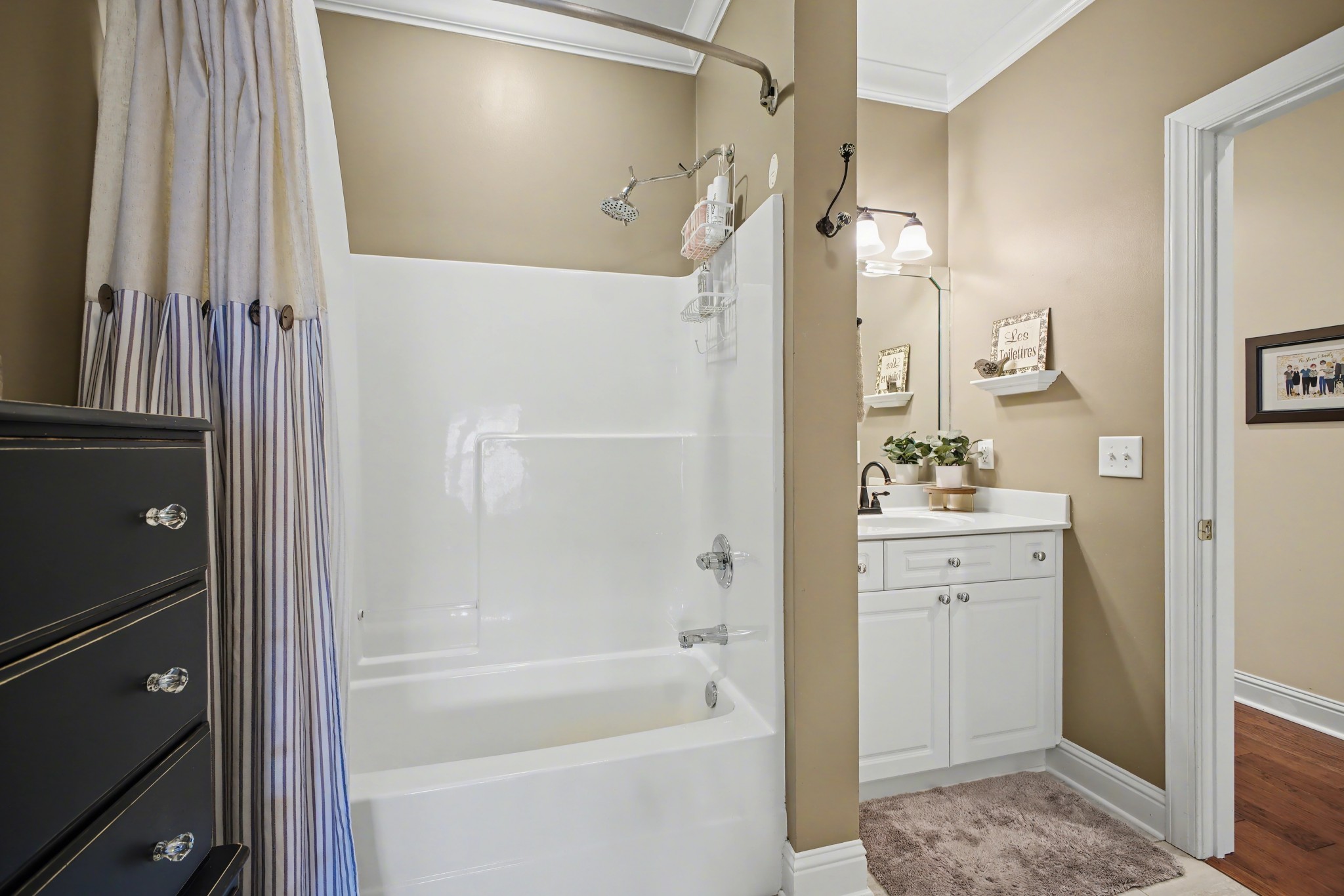 213 Lilac Circle Franklin, TN 37064 - Photo 25 of 33 a bathroom with a tub sink vanity and mirror