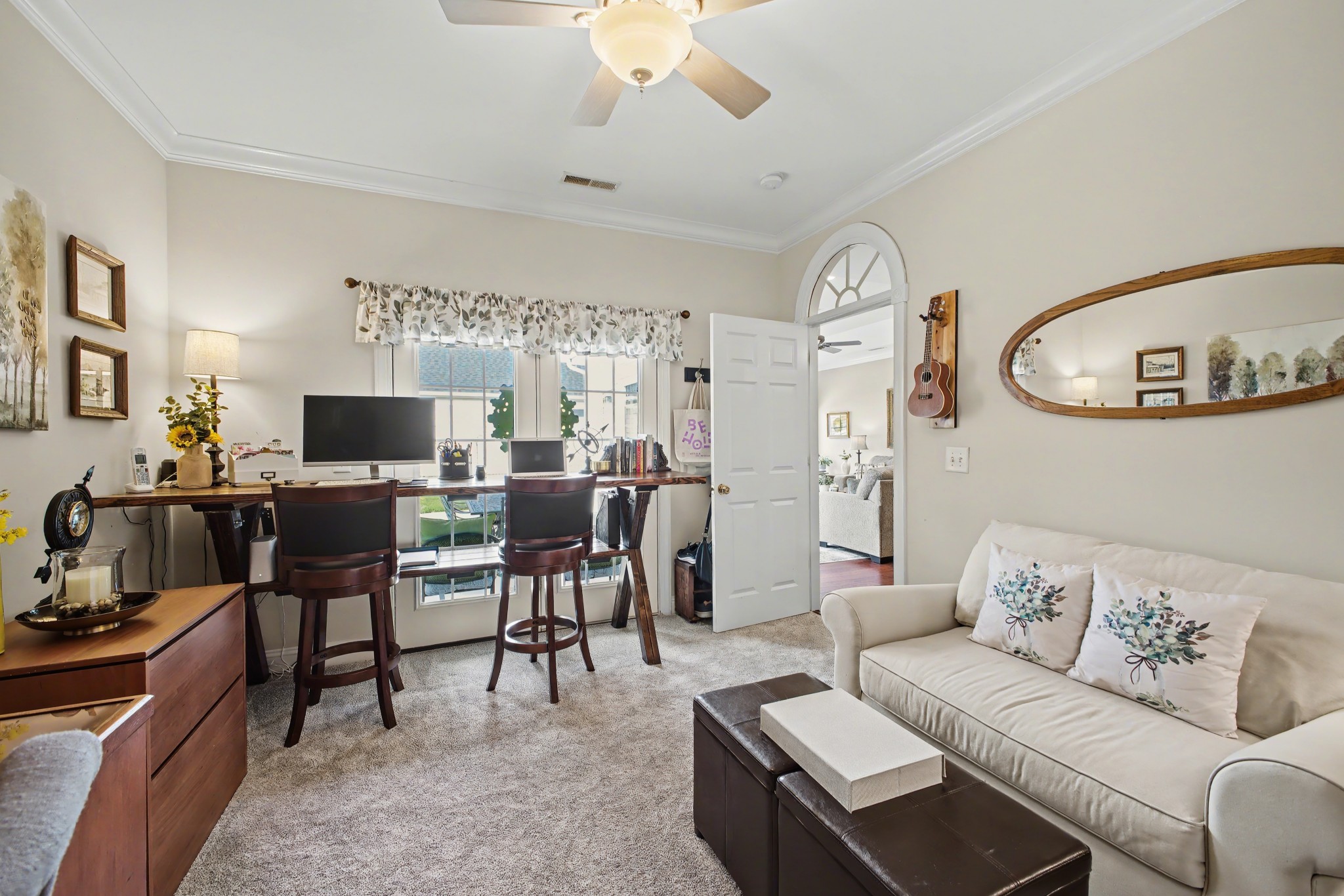 213 Lilac Circle Franklin, TN 37064 - Photo 27 of 33 a living room with furniture and a flat screen tv
