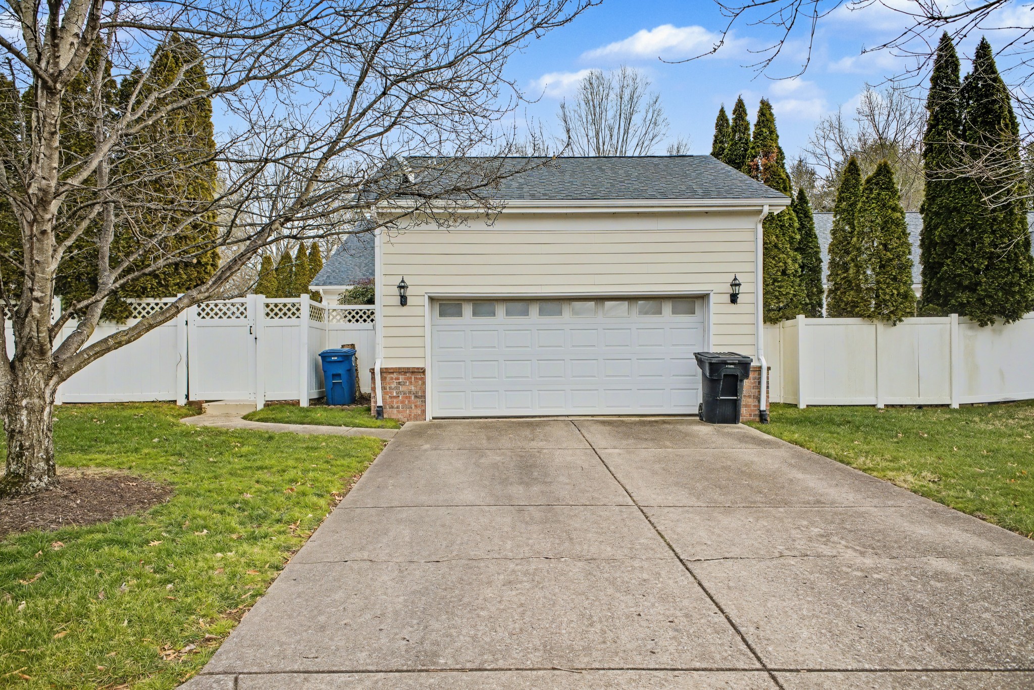 213 Lilac Circle Franklin, TN 37064 - Photo 31 of 33 a front view of a house with a yard and garage