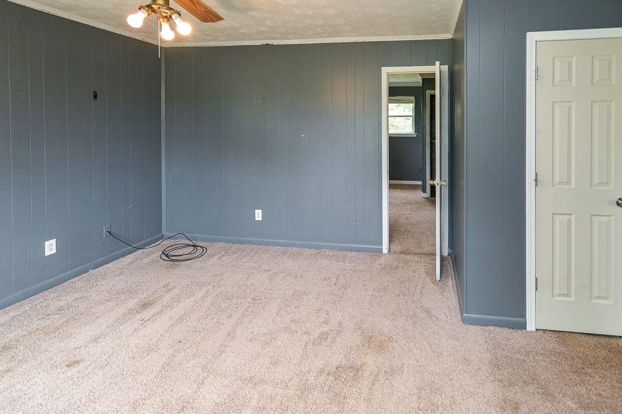 5 Layman Road Elora, TN 37328 - Photo 24 of 29 an empty room with windows and closet