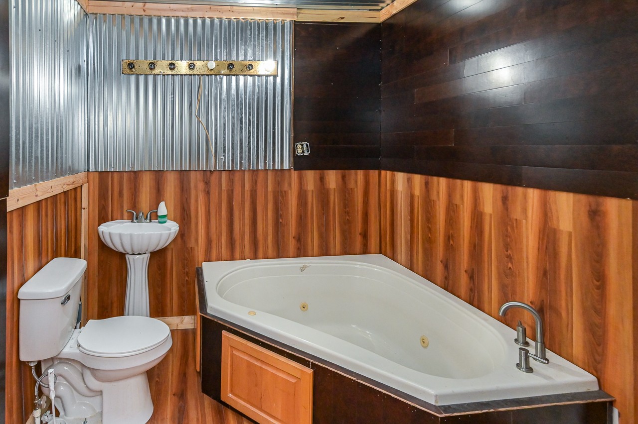 5 Layman Road Elora, TN 37328 - Photo 29 of 29 a bathroom with a sink and a toilet