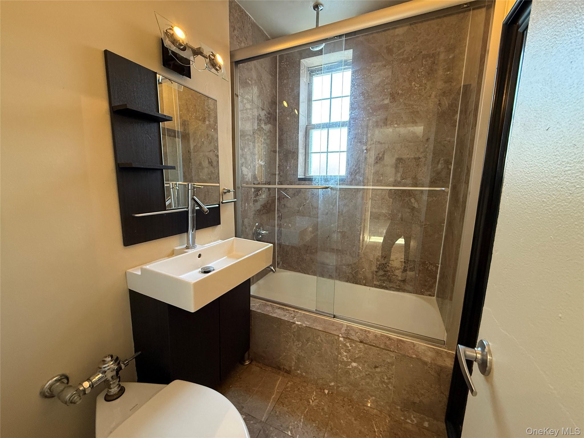 796 Bronx River Road, Unit B38 Bronxville, NY 10708 - Photo 13 of 31 a bathroom with a sink toilet and shower