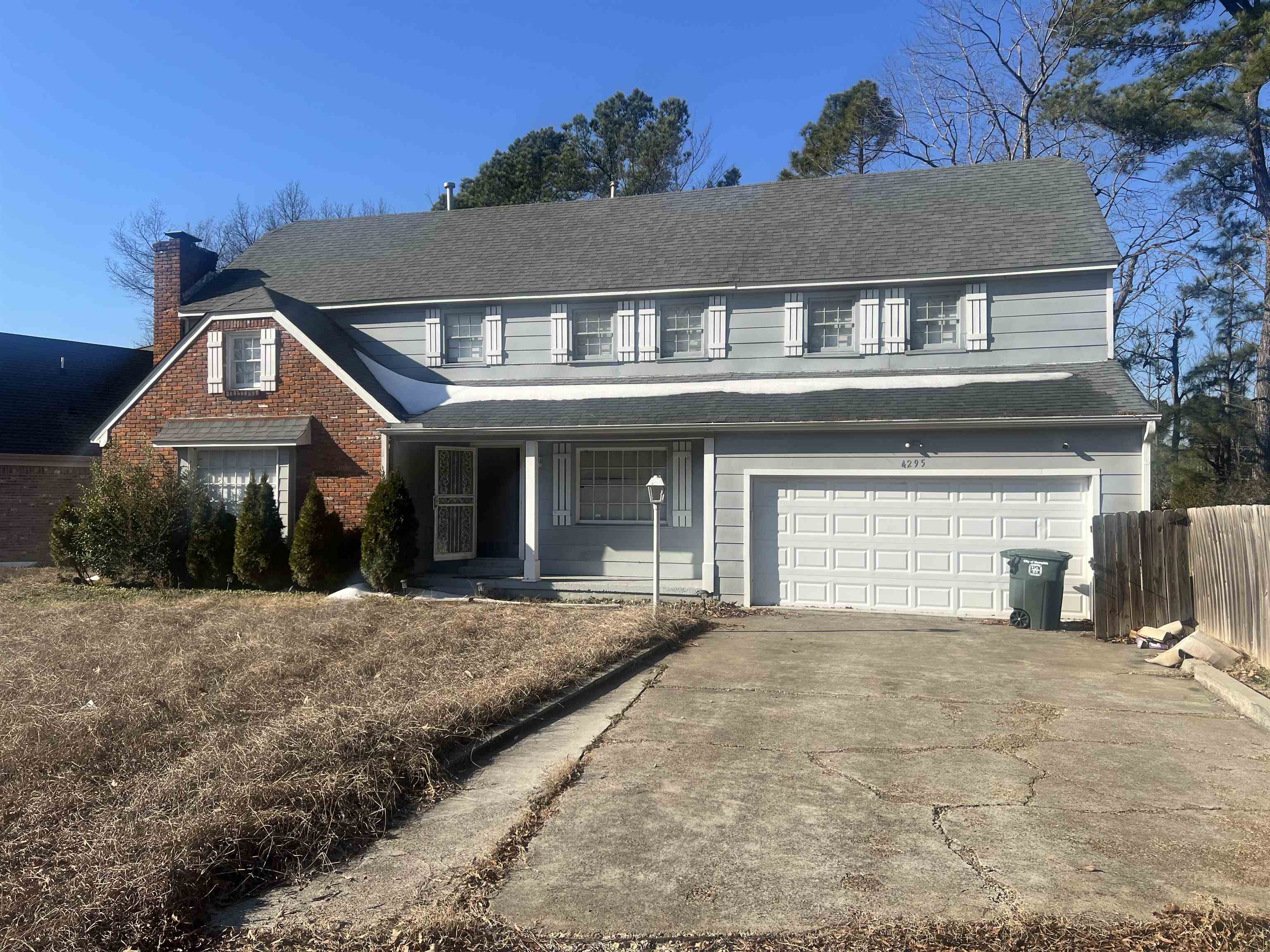 4295 Hudgins Road Memphis, TN 38116 - Photo 1 of 13 front view of a house with a yard
