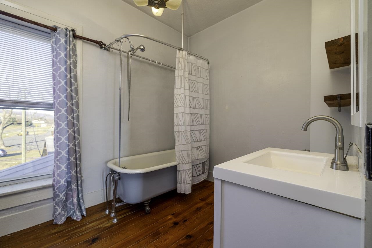 289 Brocks Gap Road Broadway, VA 22815 - Photo 20 of 46 a bathroom with a sink toilet and shower