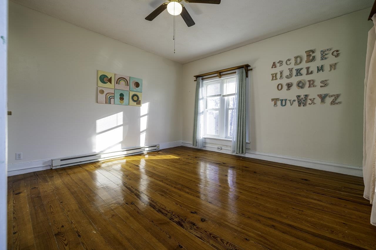 289 Brocks Gap Road Broadway, VA 22815 - Photo 22 of 46 a view of empty room with wooden floor and fan