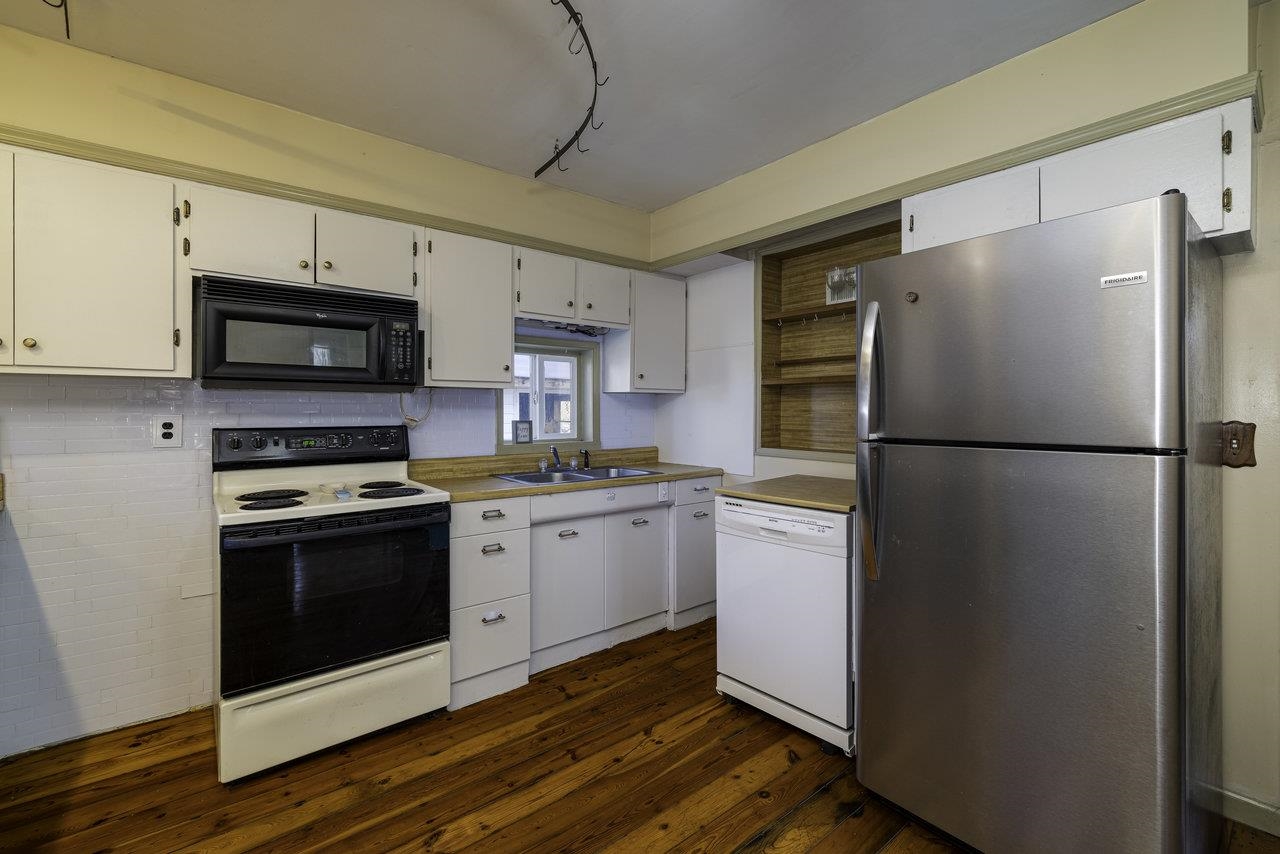 289 Brocks Gap Road Broadway, VA 22815 - Photo 3 of 46 a kitchen with a refrigerator stove and microwave