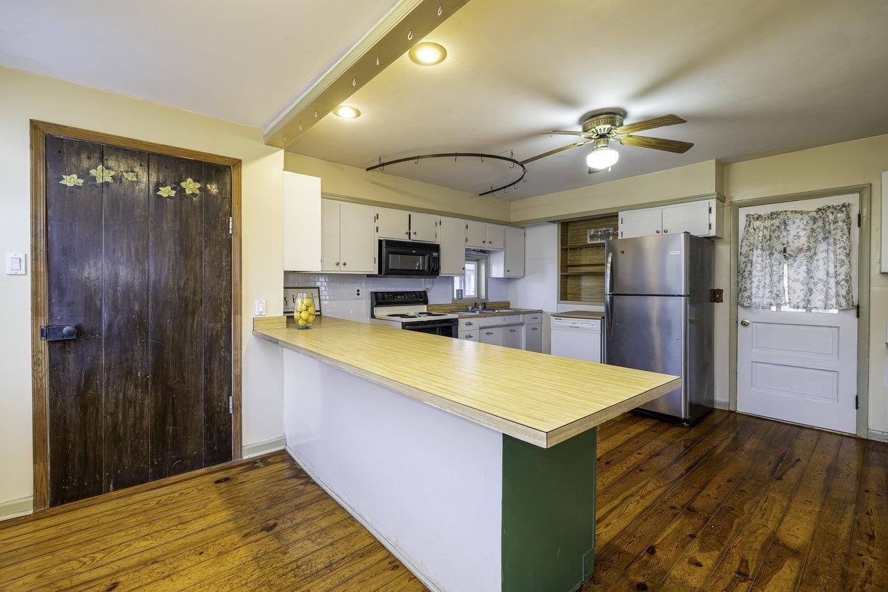 289 Brocks Gap Road Broadway, VA 22815 - Photo 5 of 46 a kitchen with stainless steel appliances granite countertop a refrigerator and a sink