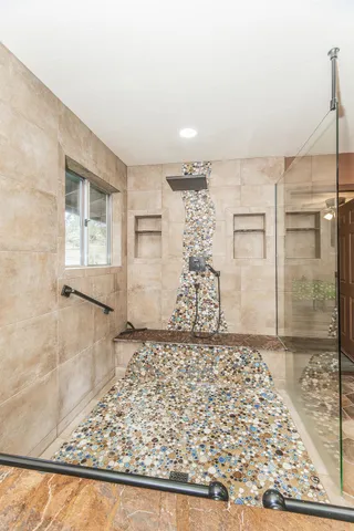 a view of a kitchen with a sink and cabinet with window