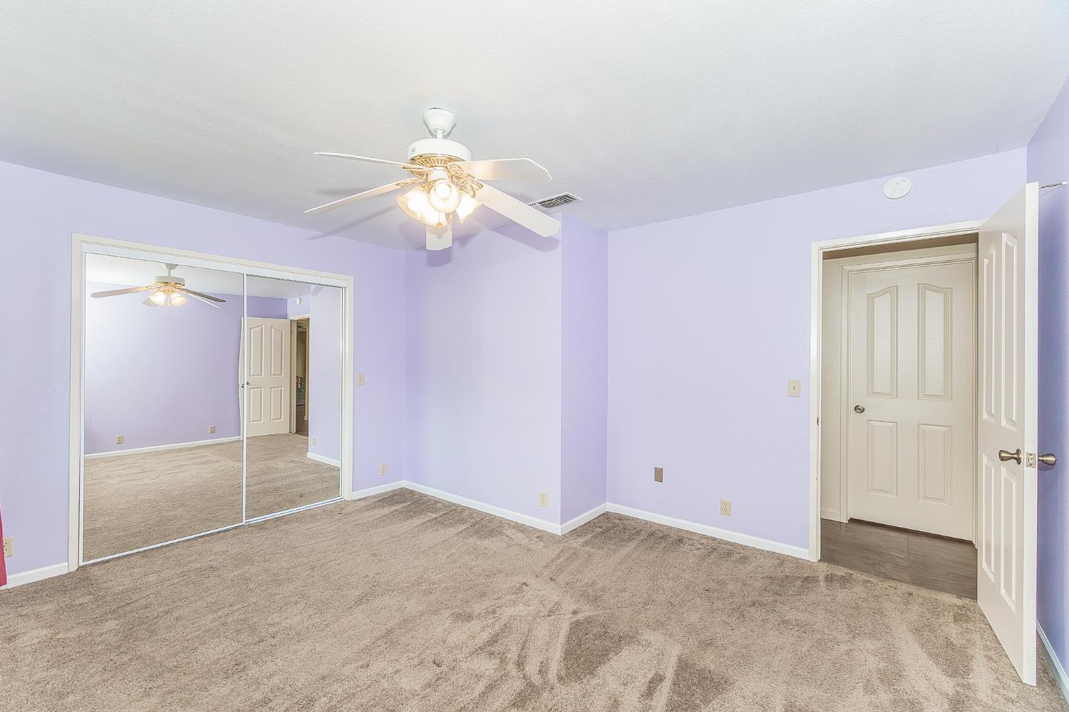 45991 Black Oak Road Coarsegold, CA 93614 - Photo 30 of 67 a view of a room with a chandelier fan and windows