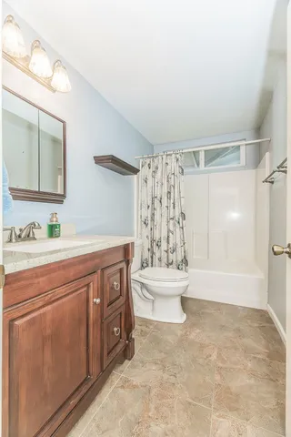 a view of backyard with green space