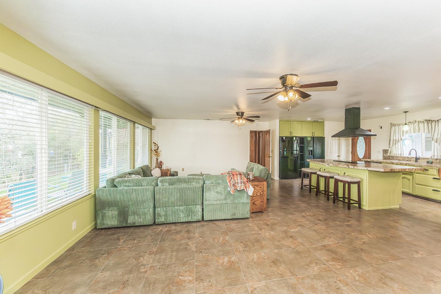 45991 Black Oak Road Coarsegold, CA 93614 - Photo 4 of 67 a living room with furniture and a large window