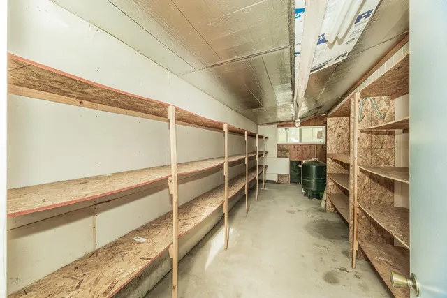 an aerial view of a house with outdoor space