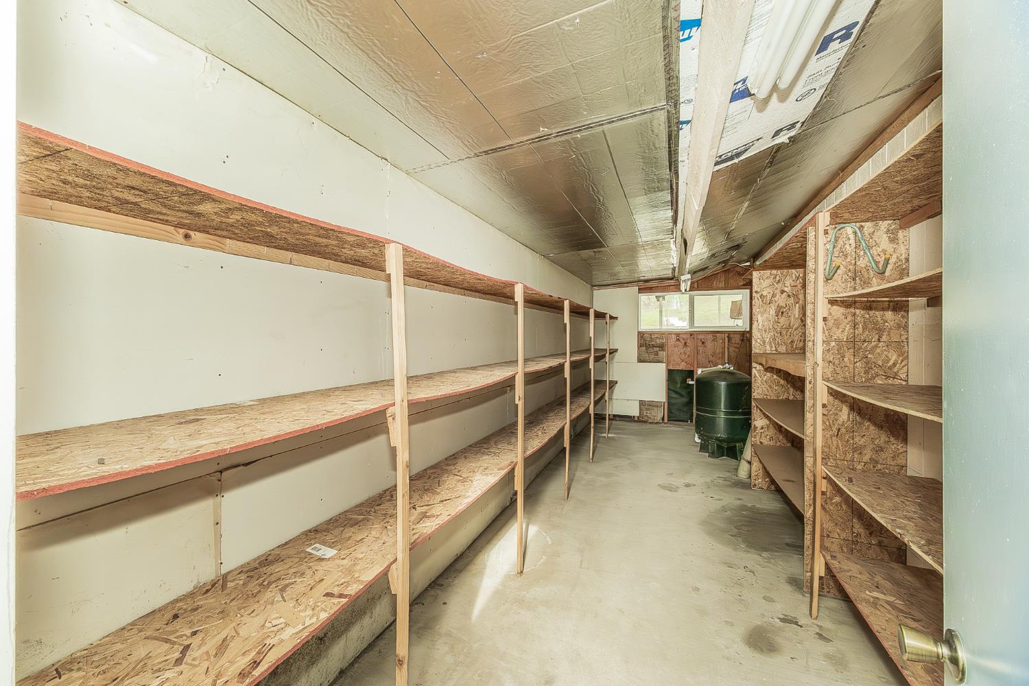 45991 Black Oak Road Coarsegold, CA 93614 - Photo 46 of 67 a view of walk in closet with clothes and shoes