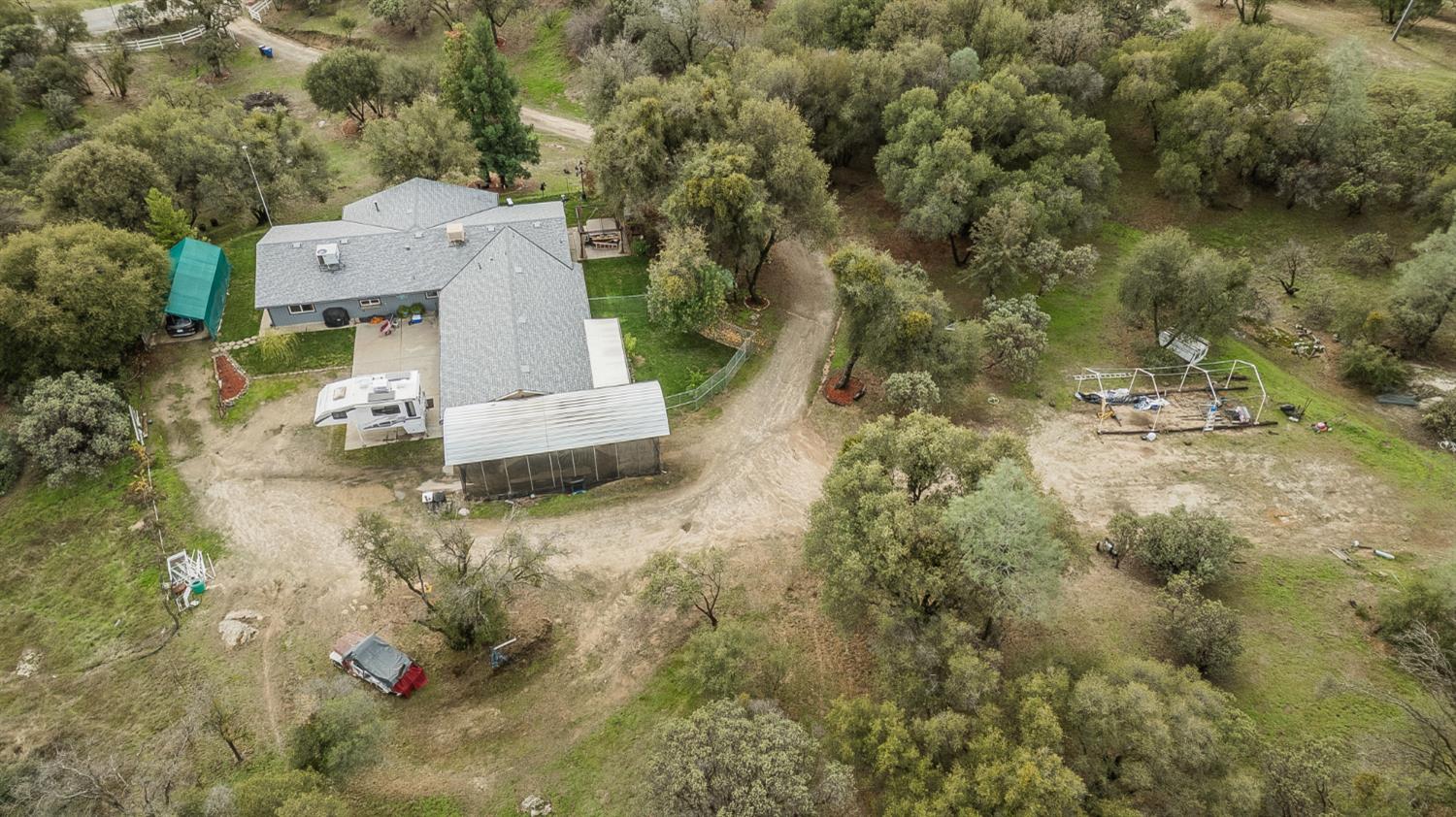 45991 Black Oak Road Coarsegold, CA 93614 - Photo 61 of 67 an aerial view of a house with a yard