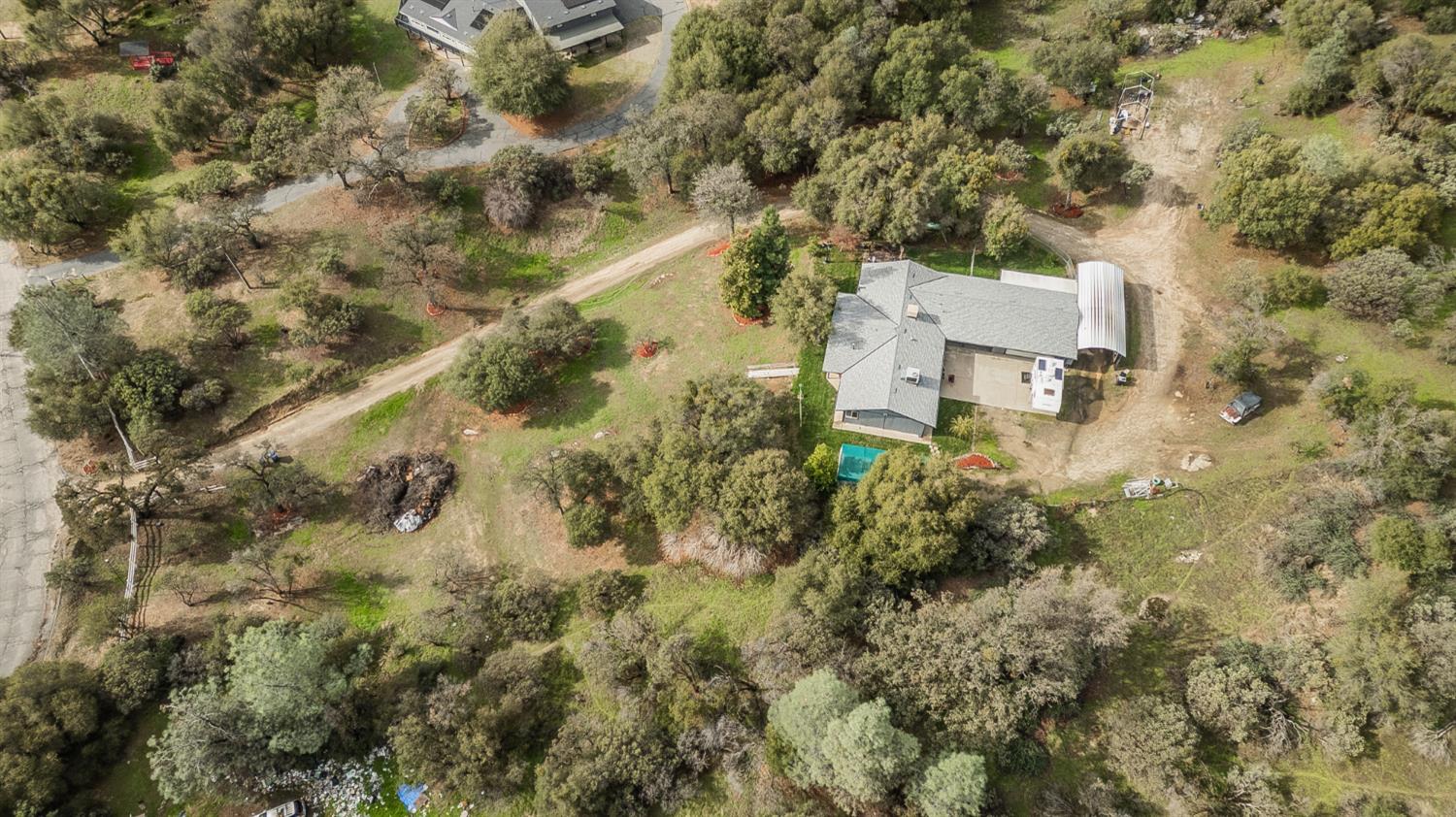45991 Black Oak Road Coarsegold, CA 93614 - Photo 62 of 67 an aerial view of a house with yard and outdoor space