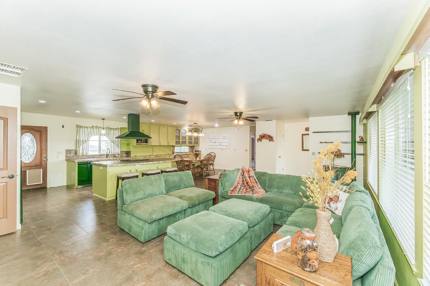 45991 Black Oak Road Coarsegold, CA 93614 - Photo 7 of 67 a living room with furniture and a large window