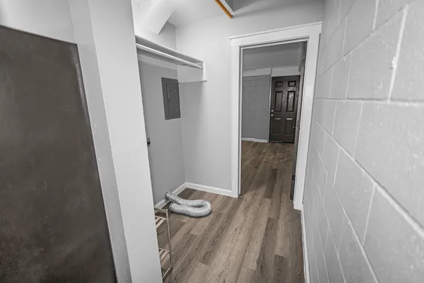 a view of a bathroom from a hallway