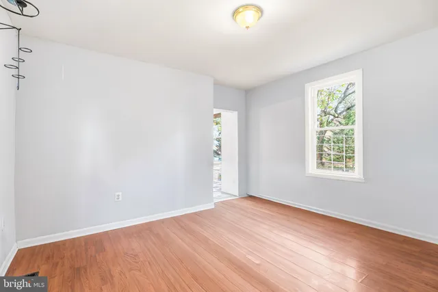 a kitchen with a sink stove and refrigerator
