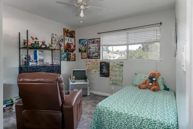 a room with furniture a window and a chandelier