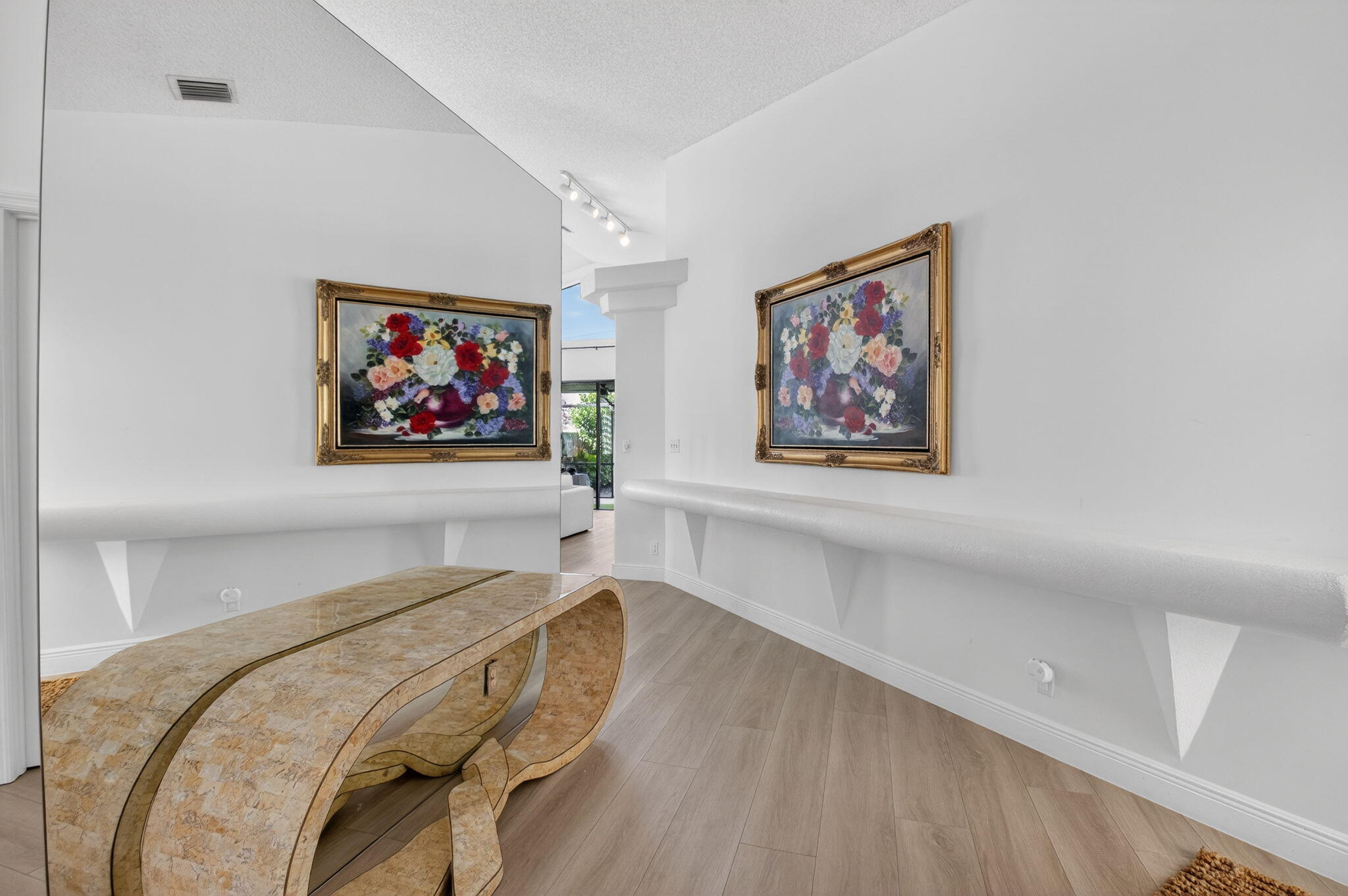 9060 Villa Portofino Circle Boca Raton, FL 33496 - Photo 12 of 47 a bedroom with a bed and a painting on the wall