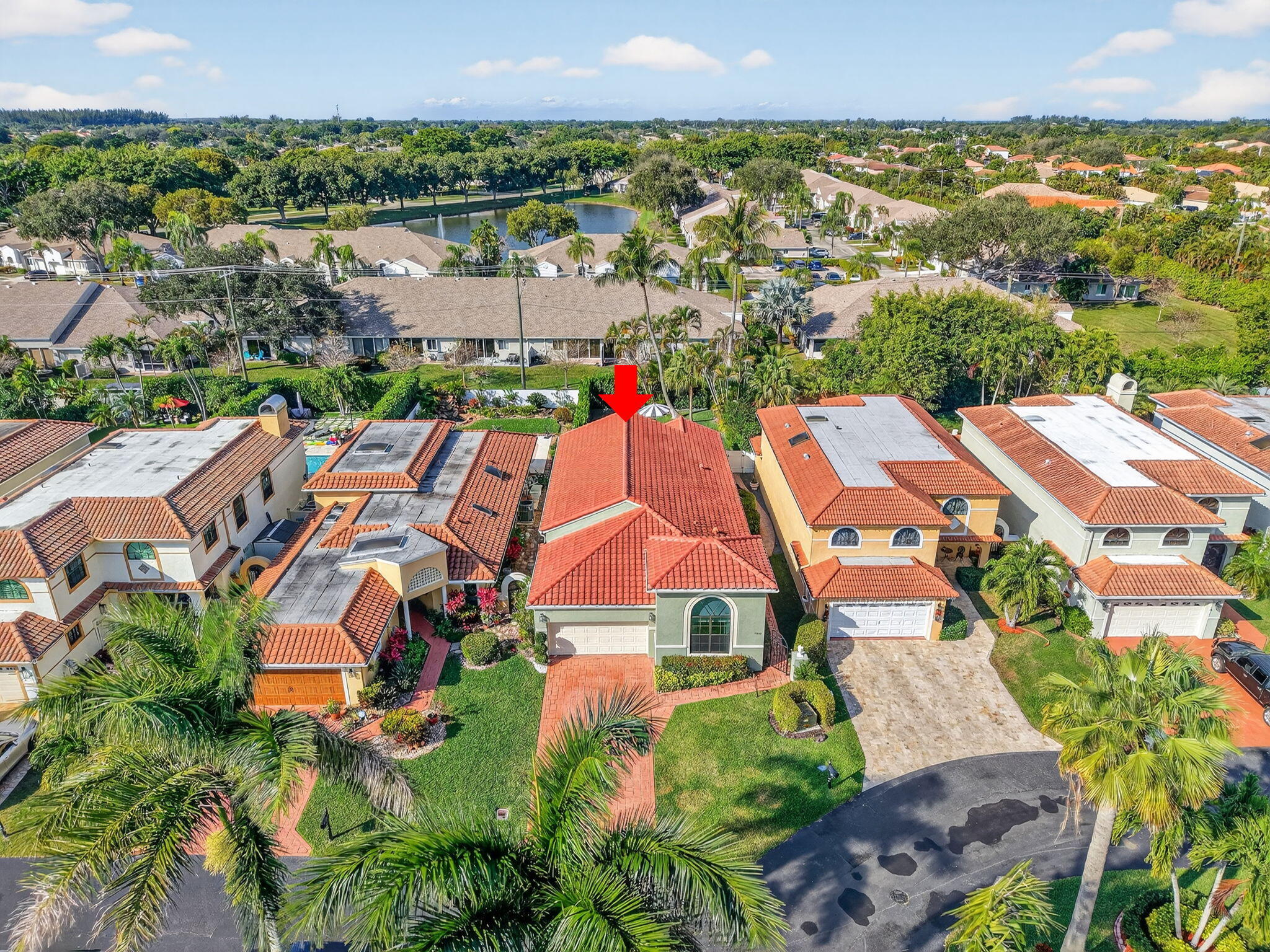 9060 Villa Portofino Circle Boca Raton, FL 33496 - Photo 39 of 47 an aerial view of residential houses with outdoor space and swimming pool