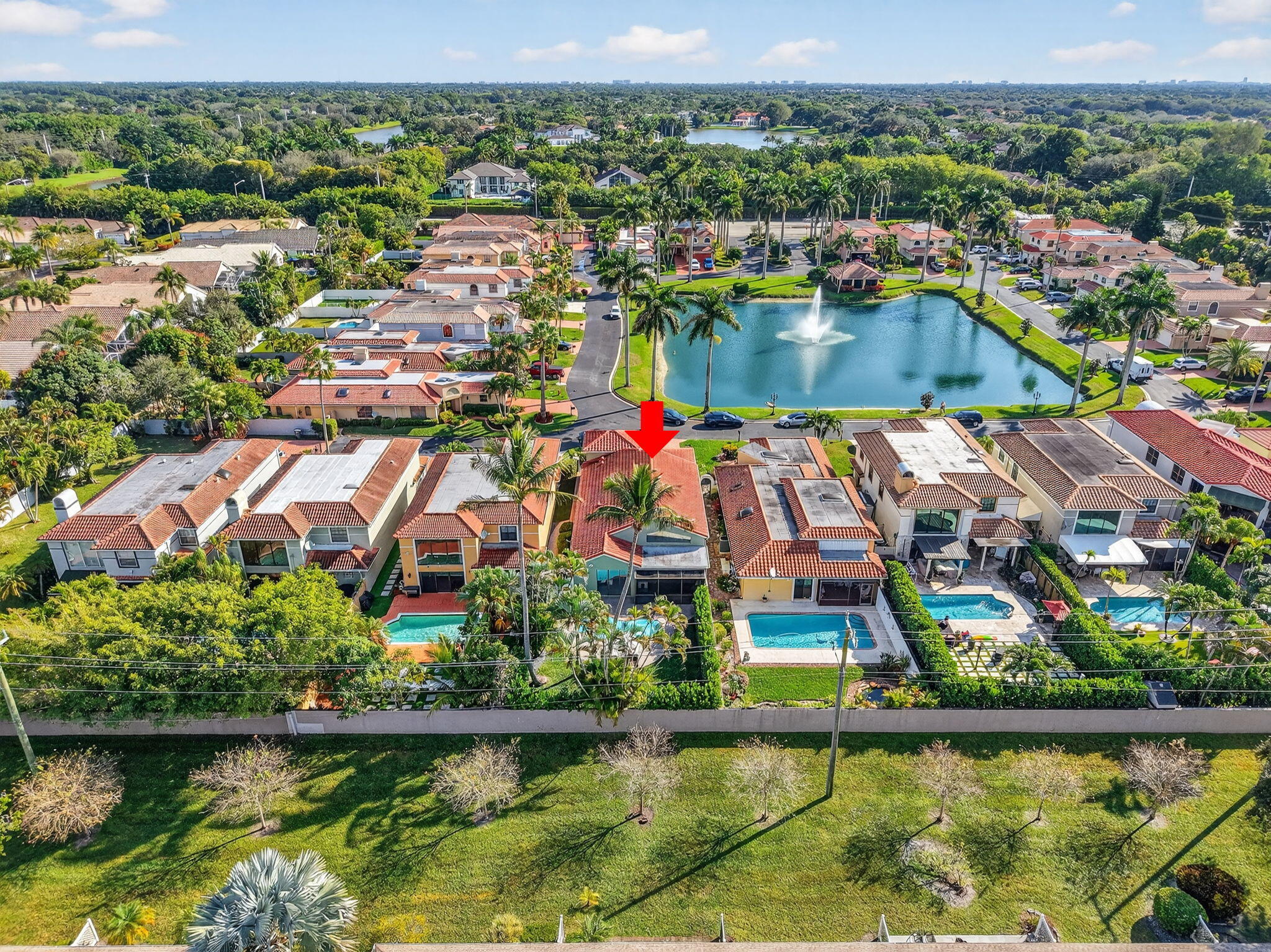 9060 Villa Portofino Circle Boca Raton, FL 33496 - Photo 42 of 47 an aerial view of residential houses with outdoor space and swimming pool