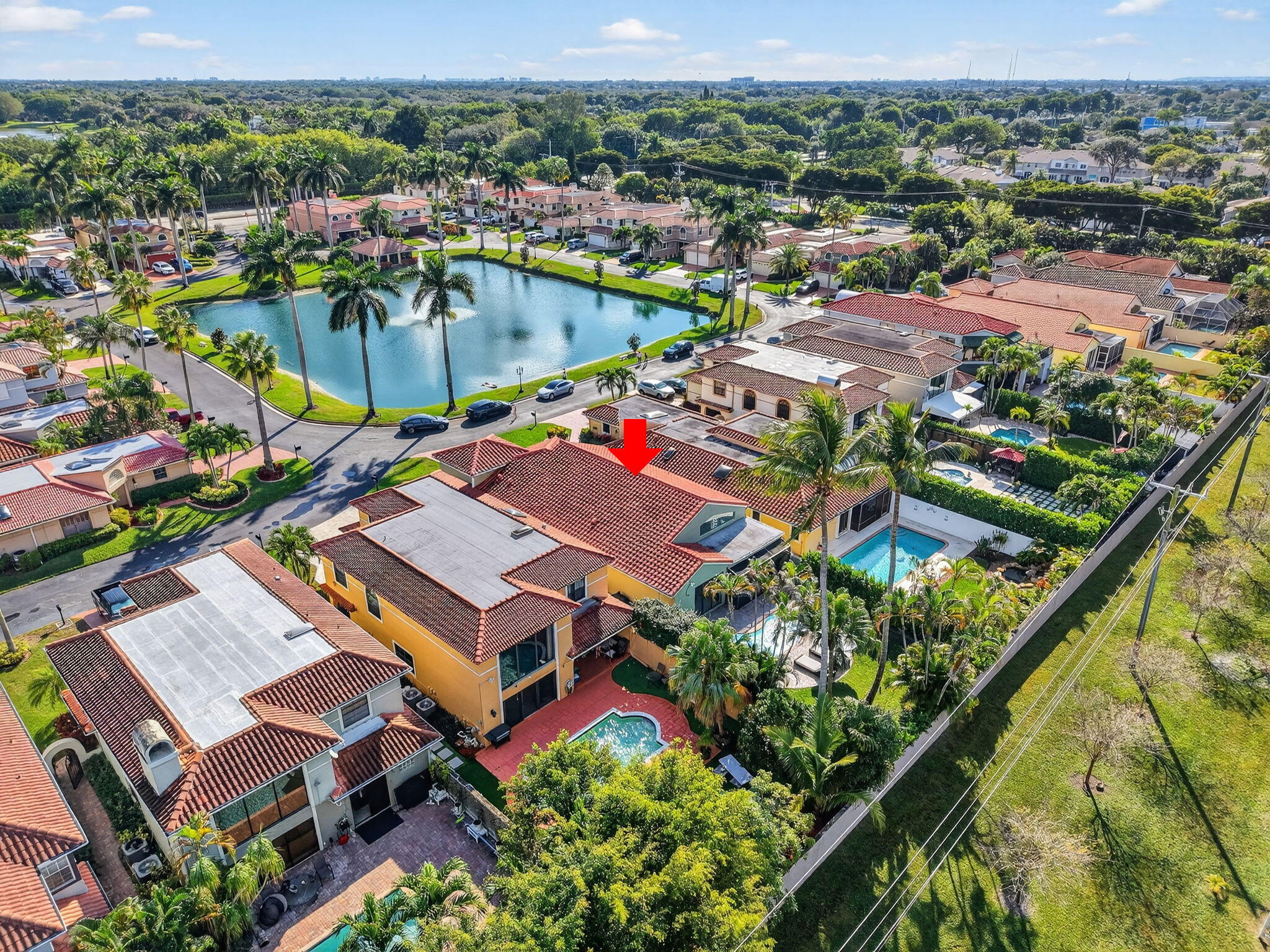 9060 Villa Portofino Circle Boca Raton, FL 33496 - Photo 43 of 47 an aerial view of residential house with outdoor space and swimming pool