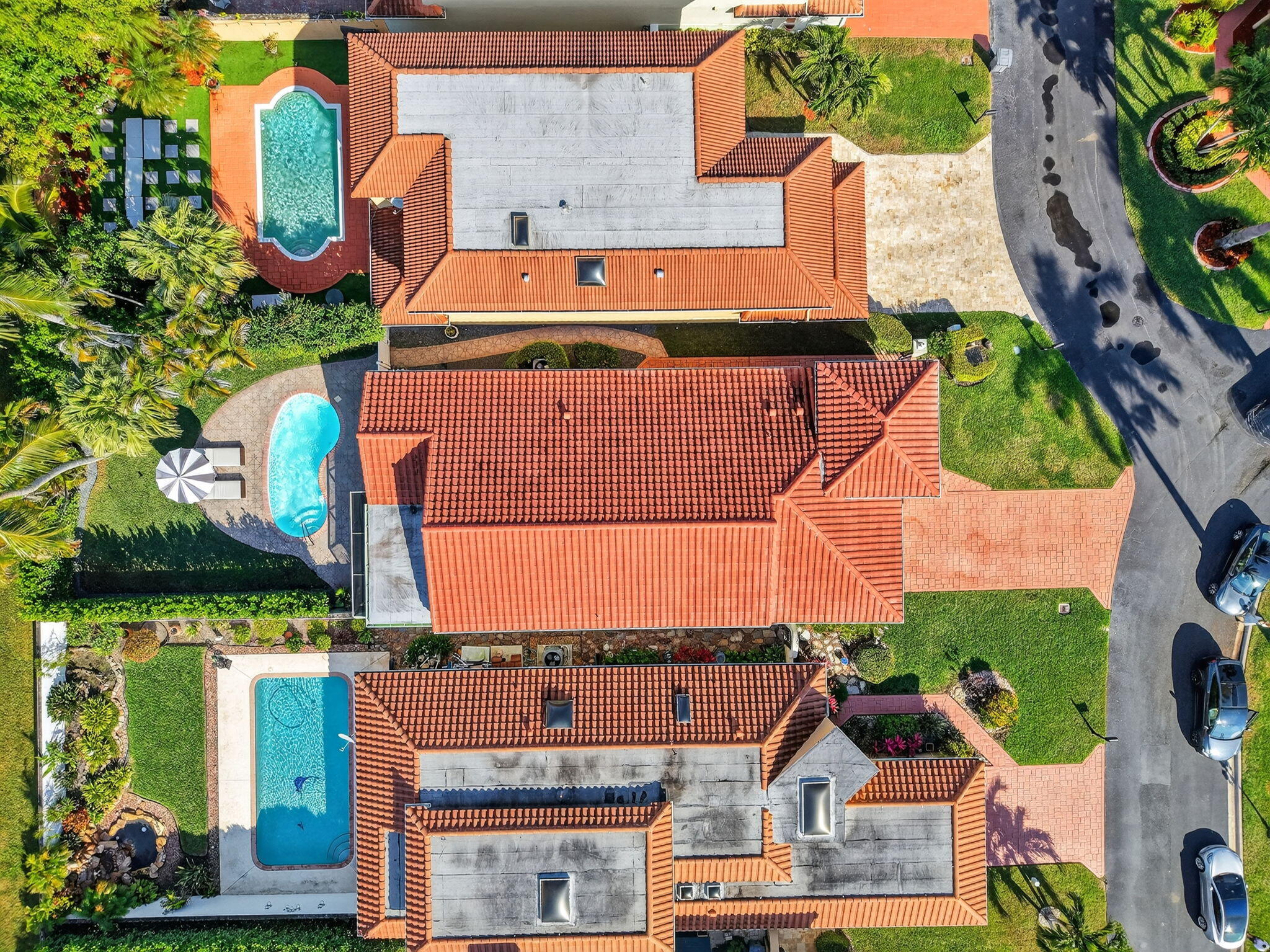9060 Villa Portofino Circle Boca Raton, FL 33496 - Photo 47 of 47 an aerial view of a house with a garden
