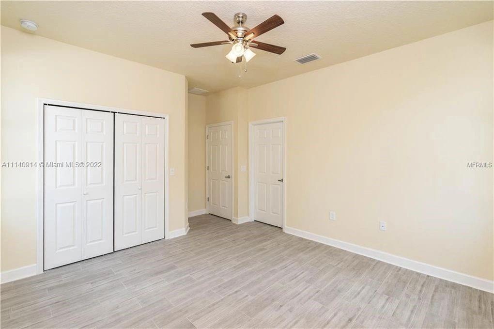 475 Sunset Road North Rotonda West, FL 33947 - Photo 4 of 14 a view of an empty room