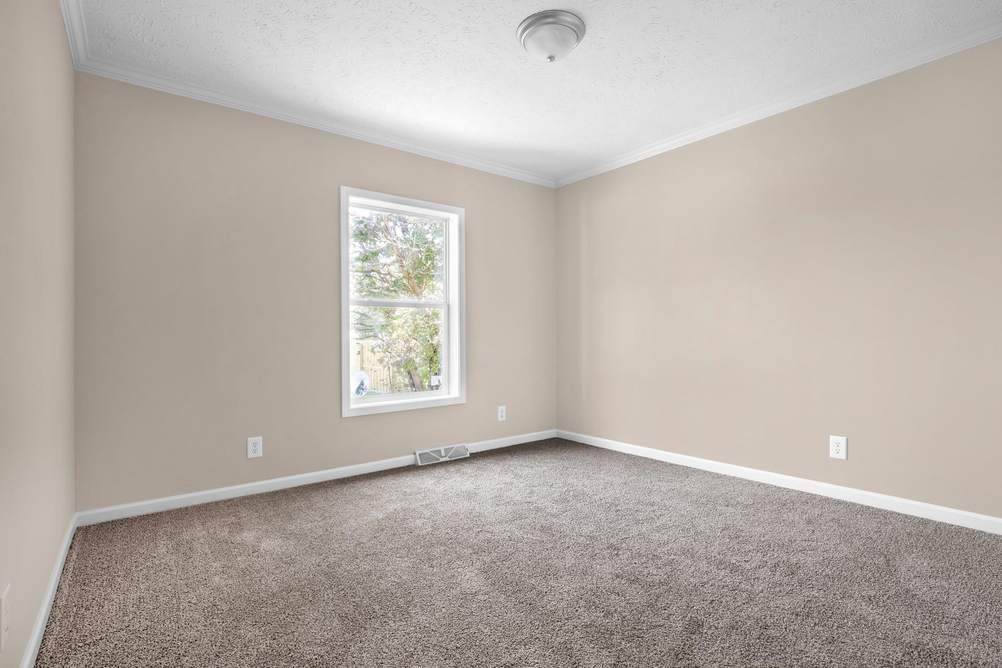 2380 Byrds Mill Road Erwin, NC 28339 - Photo 16 of 36 an empty room with a window