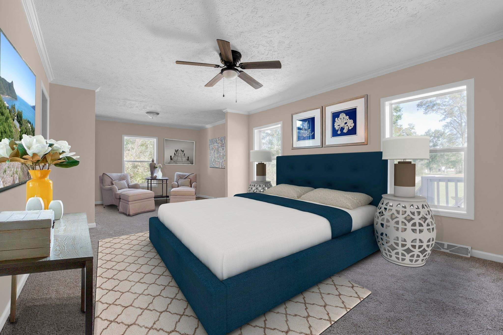 2380 Byrds Mill Road Erwin, NC 28339 - Photo 22 of 36 a spacious bedroom with a bed a couch and a window