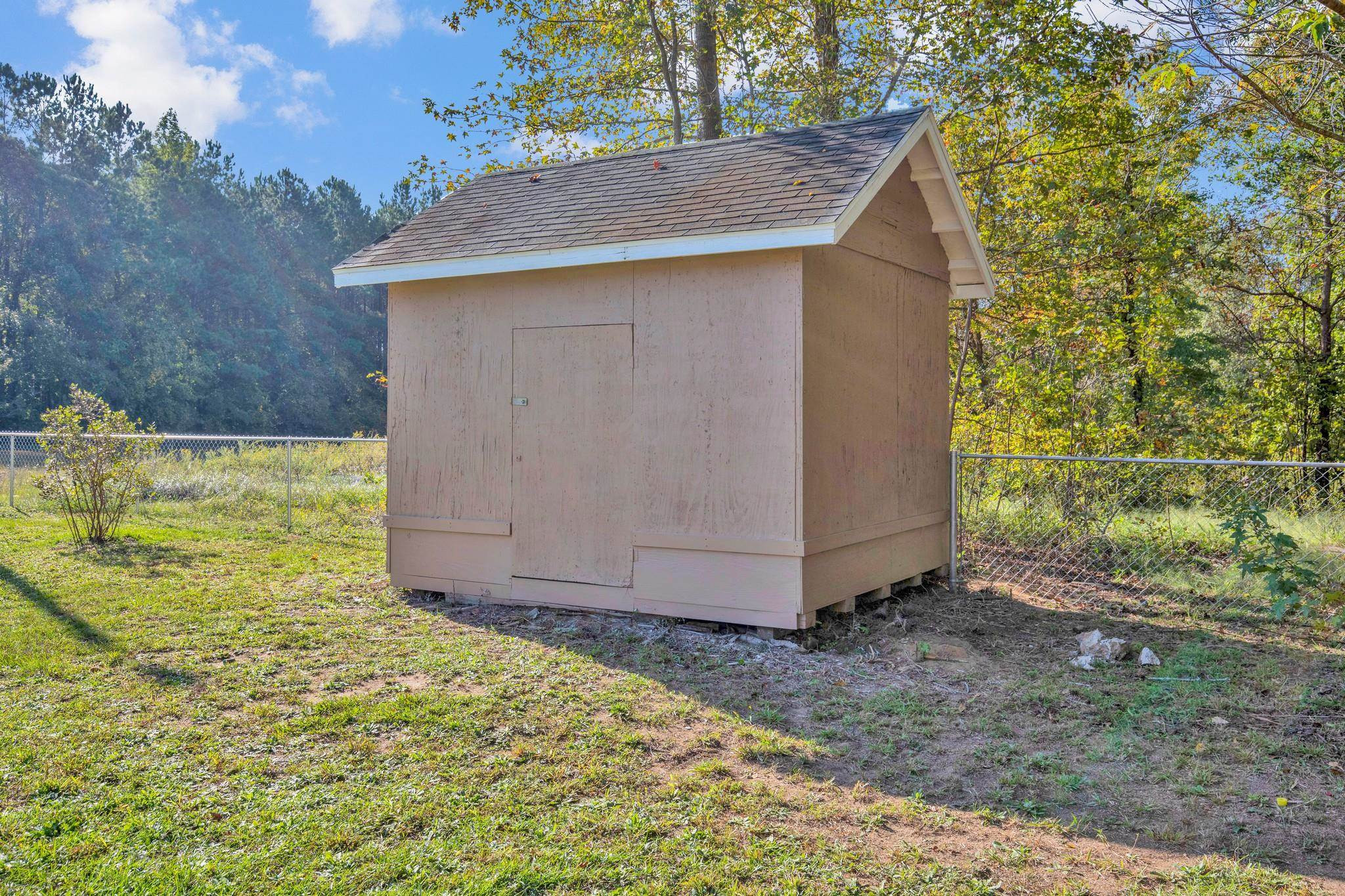 2380 Byrds Mill Road Erwin, NC 28339 - Photo 31 of 36 a bath tub sitting in middle of tall trees