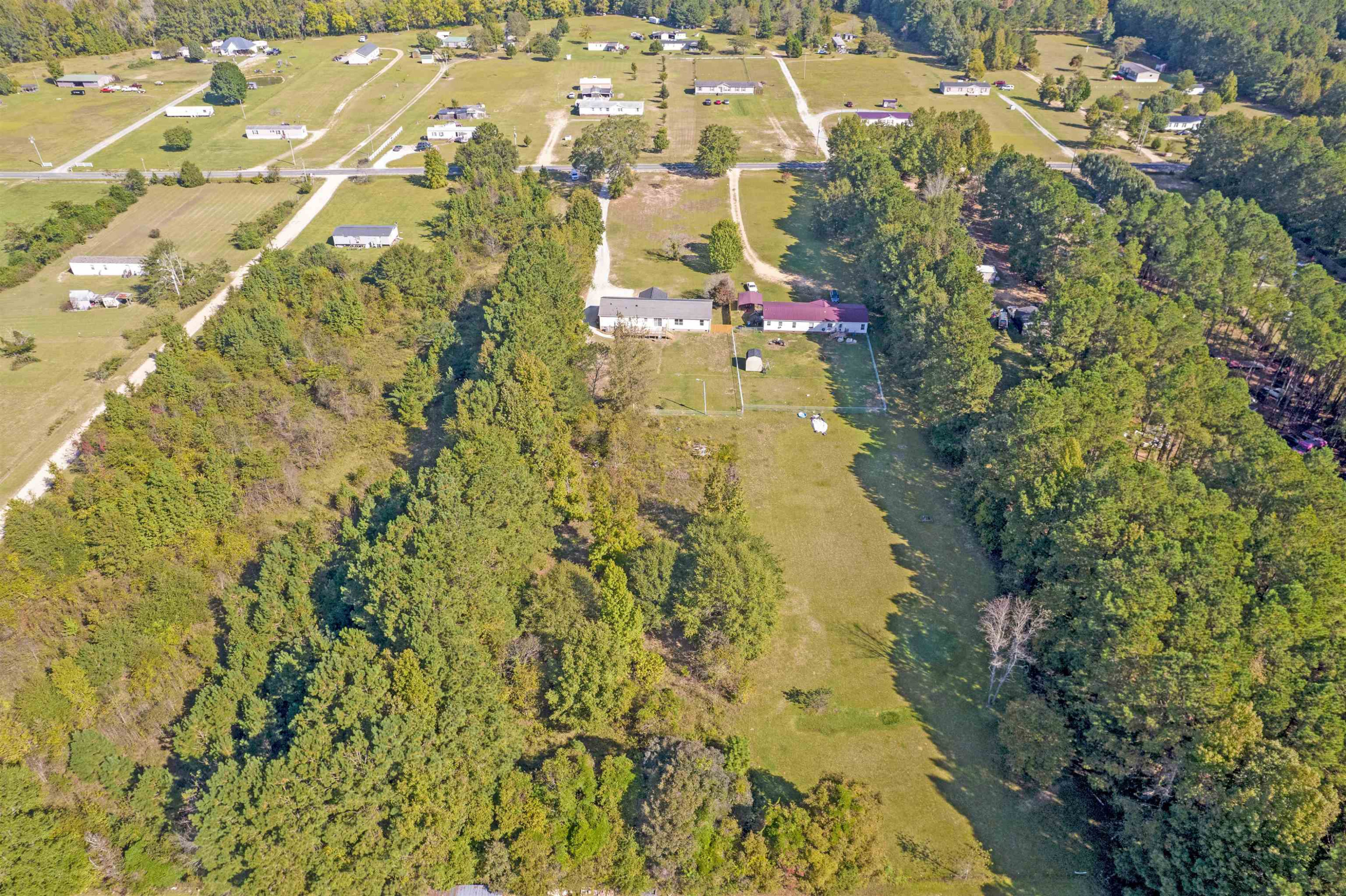 2380 Byrds Mill Road Erwin, NC 28339 - Photo 34 of 36 a view of residential houses with swimming pool