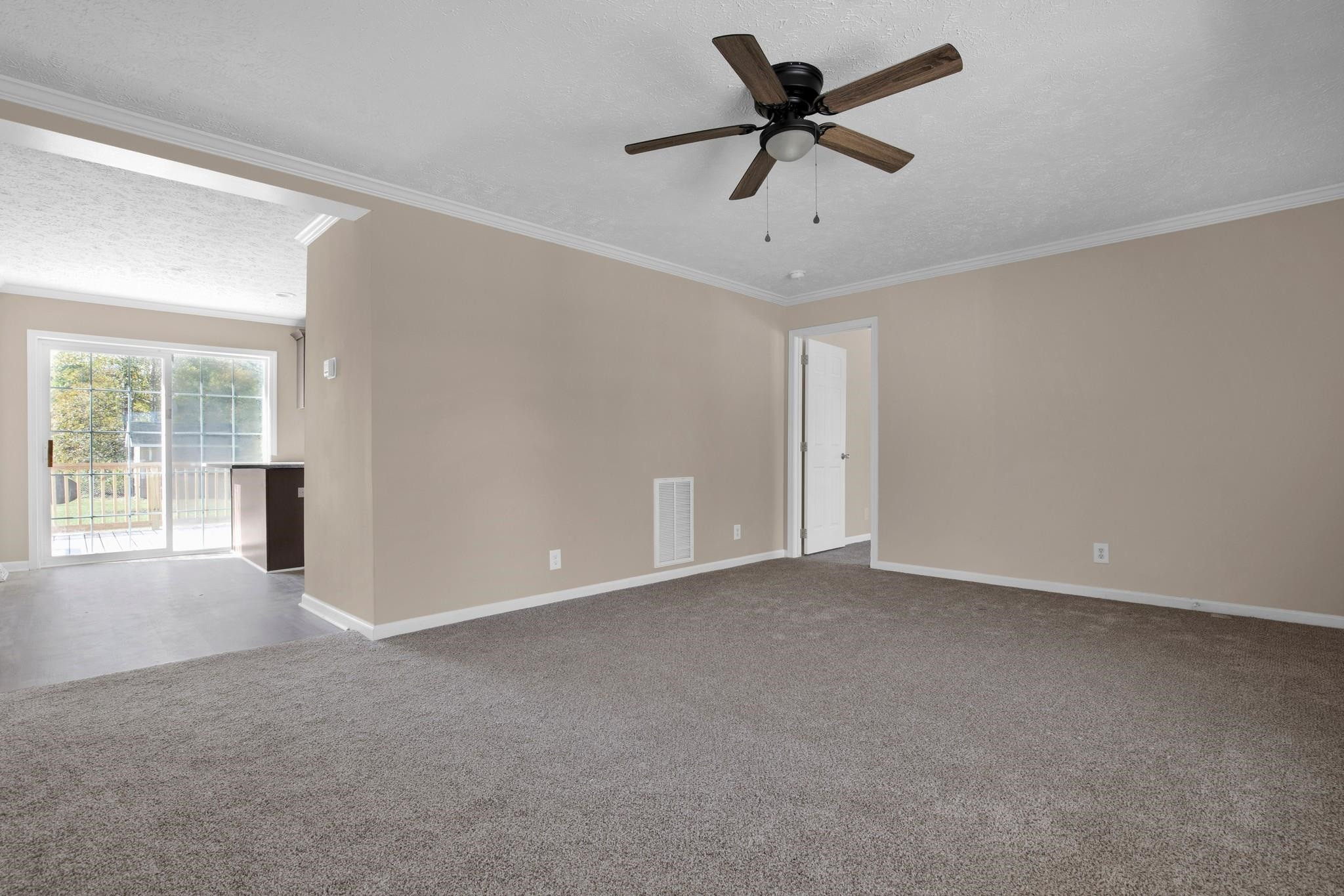 2380 Byrds Mill Road Erwin, NC 28339 - Photo 7 of 36 a view of an empty room with a window