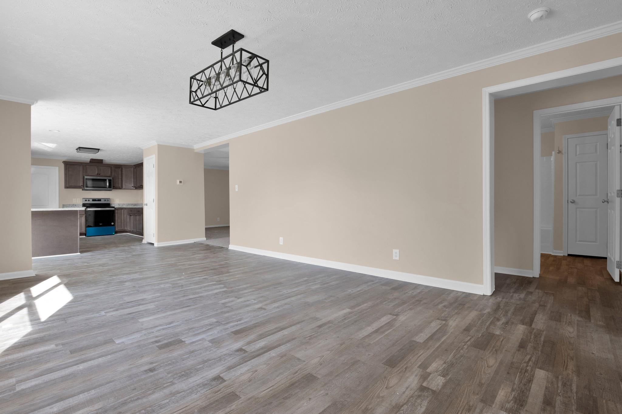 2380 Byrds Mill Road Erwin, NC 28339 - Photo 9 of 36 a view of empty room with wooden floor