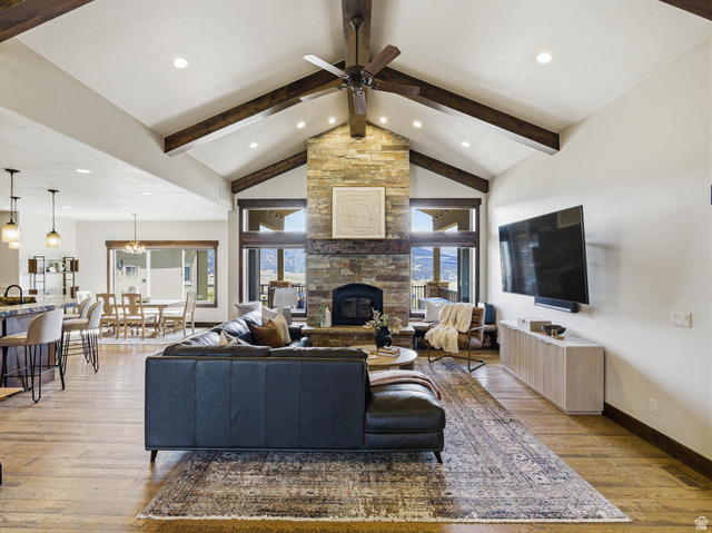 402 Shadow Hill Road Wanship, UT 84017 - Photo 11 of 90 Living area with light wood finished floors, ceiling fan, a stone fireplace, and recessed lighting