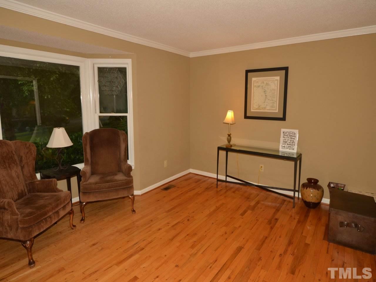 2821 Old Orchard Road Raleigh, NC 27607 - Photo 4 of 25 a view of workspace with wooden floor