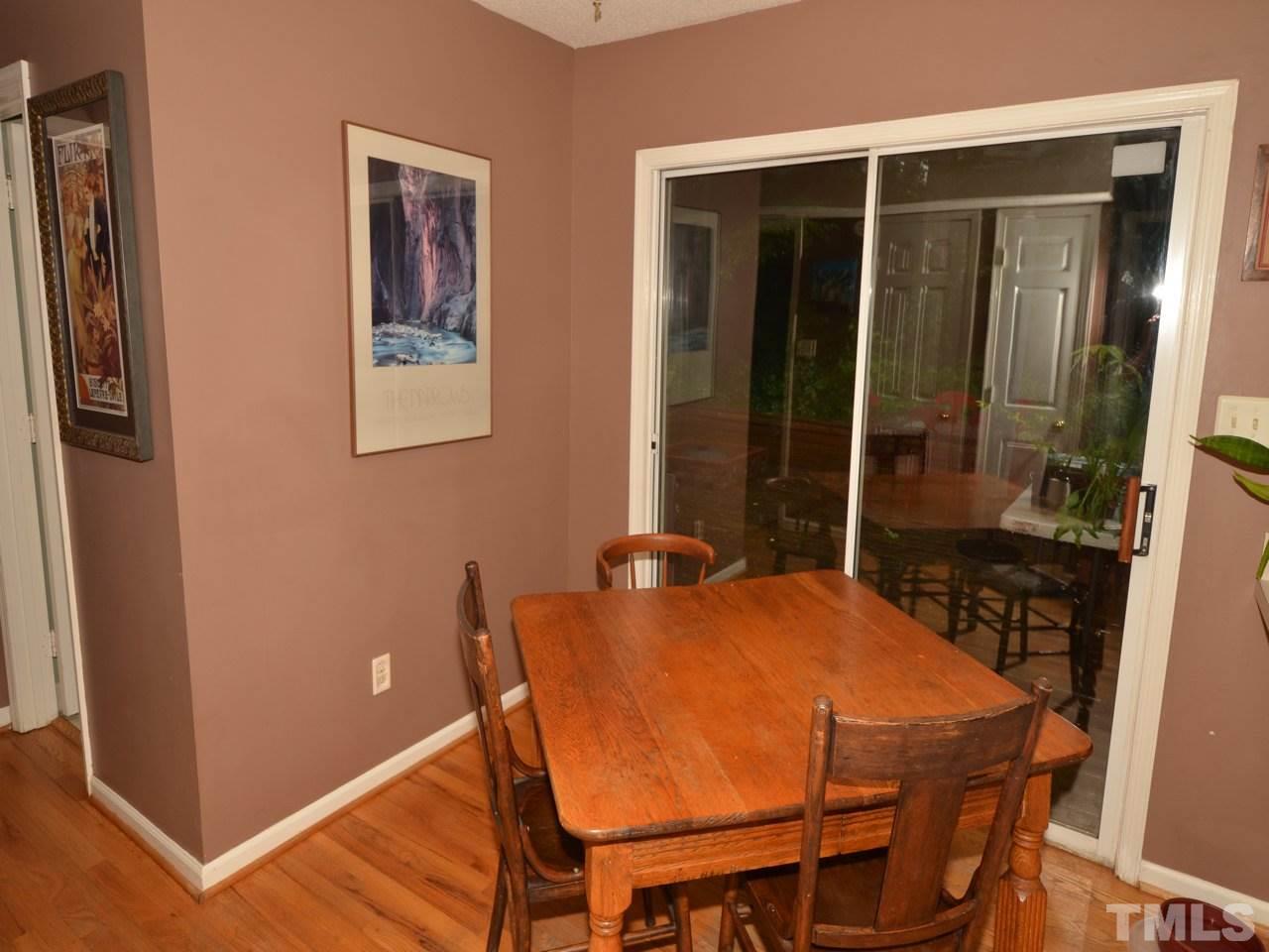2821 Old Orchard Road Raleigh, NC 27607 - Photo 10 of 25 a dining room with furniture and window