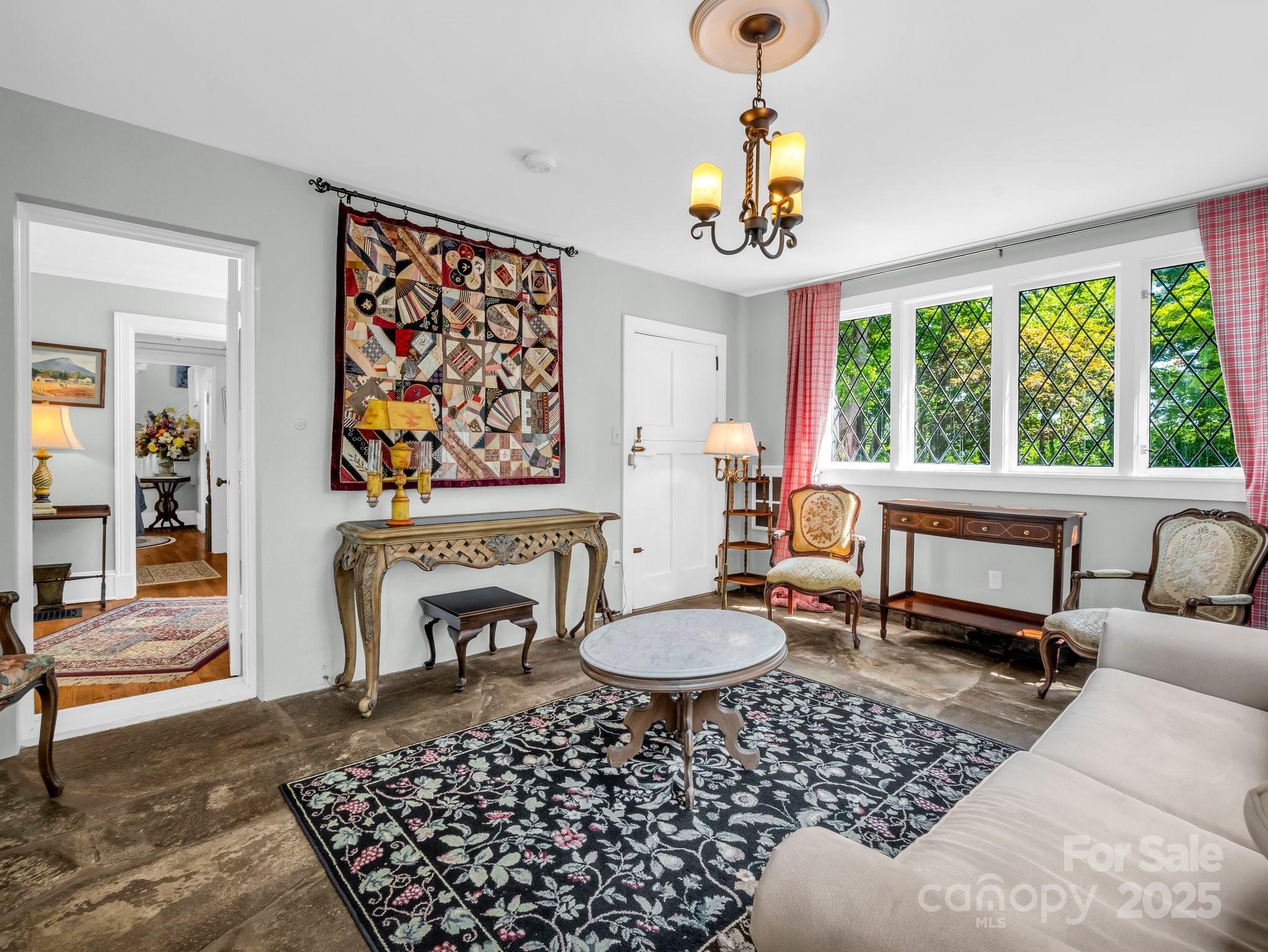 287 Pacolet Ridge Lane Tryon, NC 28782 - Photo 23 of 48 a living room with furniture and a rug